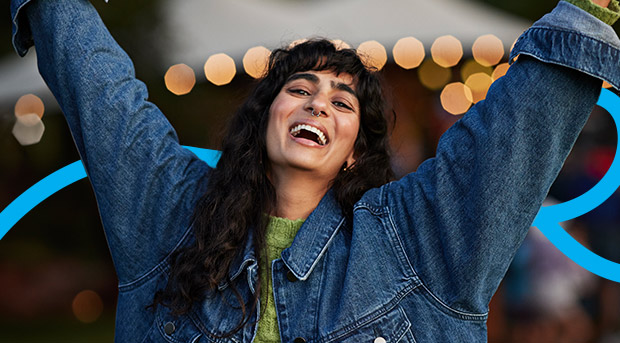 A woman celebrates maintaining good habits.